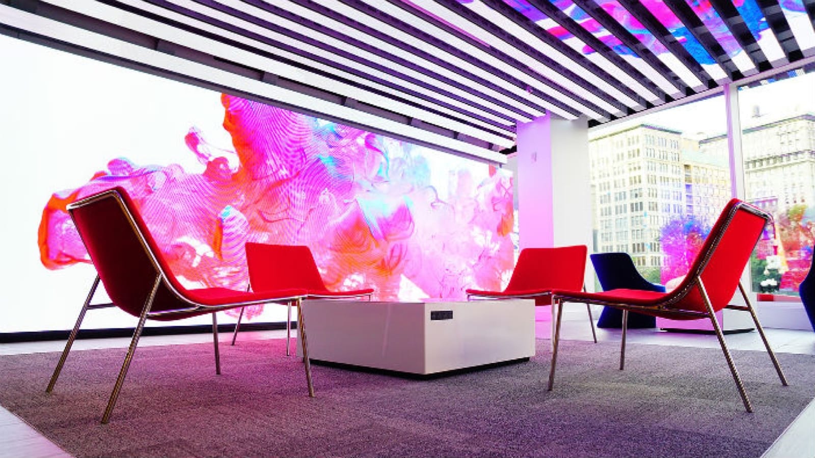 Capital One café interior with digital content displays